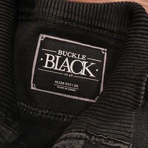 Buckle black sweater